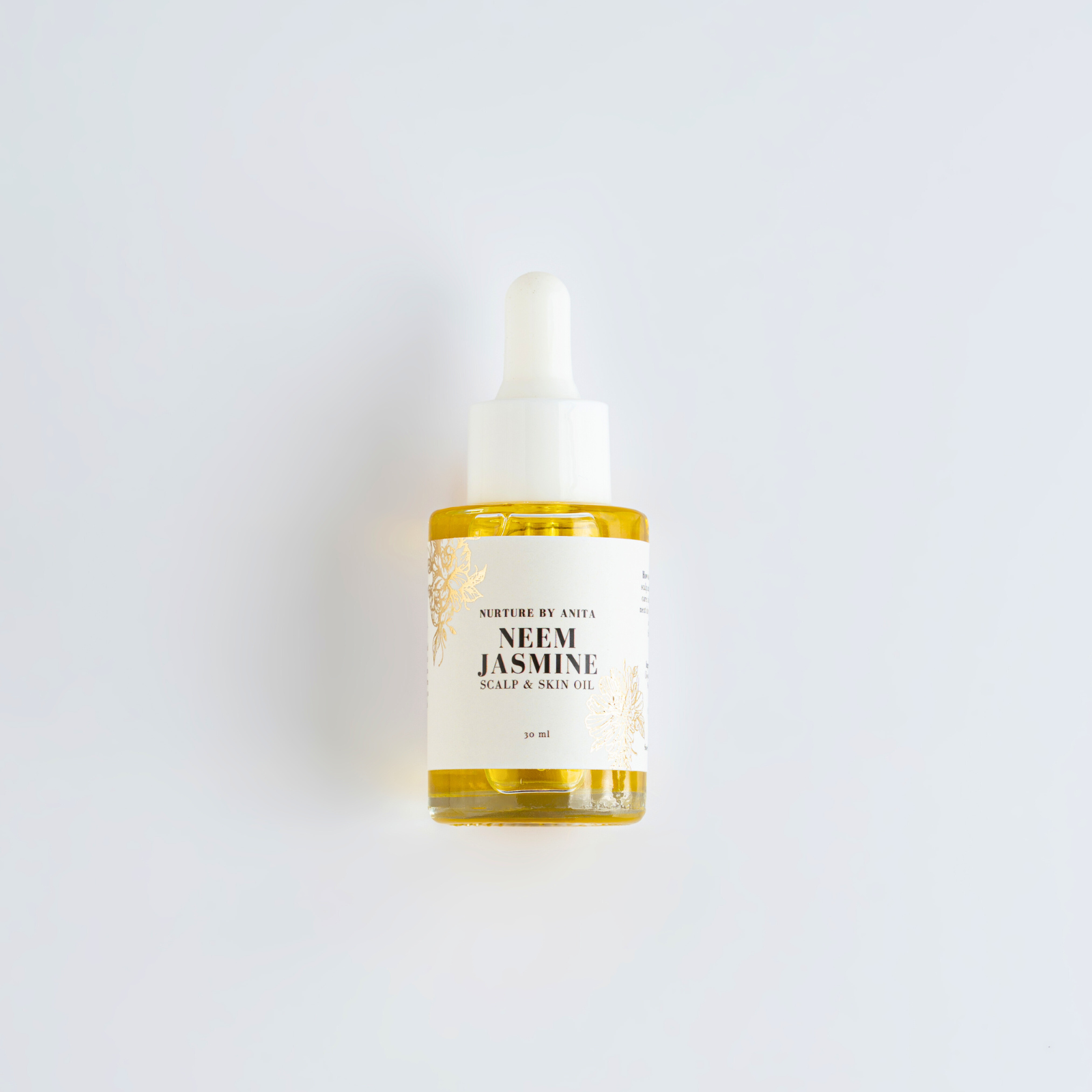 Pure Golden Jojoja Oil infused with the rich benefits of Night Blooming Jasmine and Need