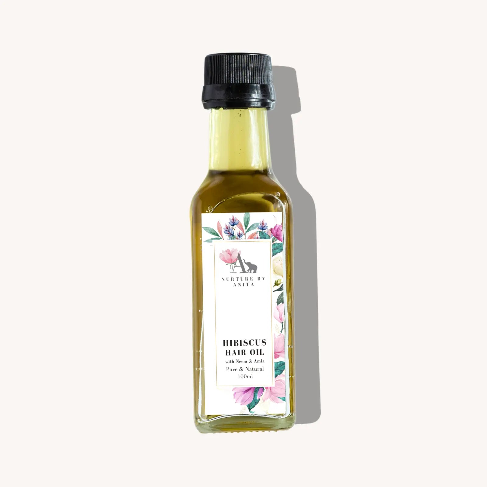 Hibiscus Hair Oil by Nurture by Anita - a lightweight, all-natural blend of neem, amla, hibiscus, castor, and coconut oils, crafted for hair-fall control, scalp detox, and root strengthening. Ideal for oily scalp and fine hair types