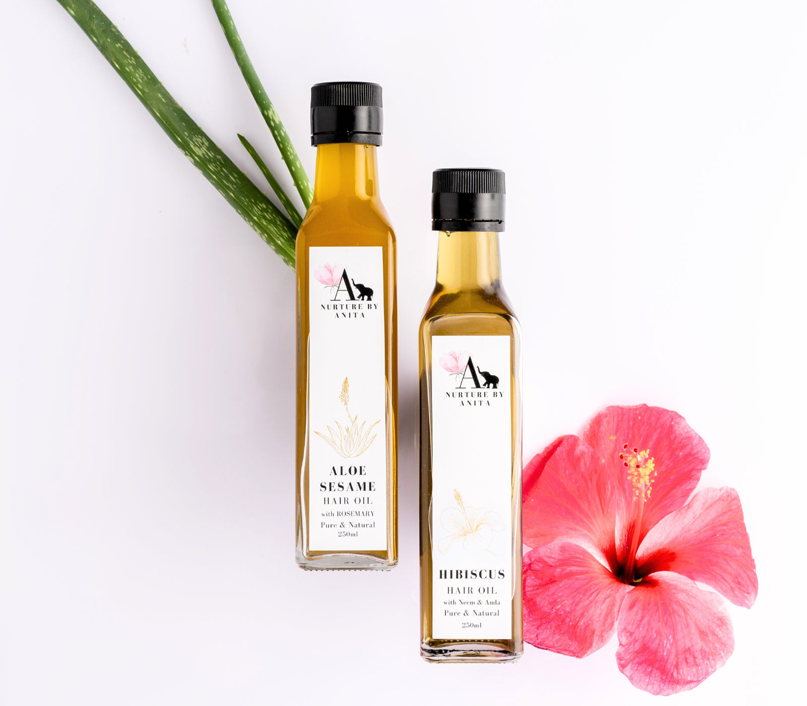 Hair Recovery Ritual to improve hair growth and combat hair thinning and balding with Nurture by Anita's Hibiscus Hair Oil and AloeSesame Hair Oil